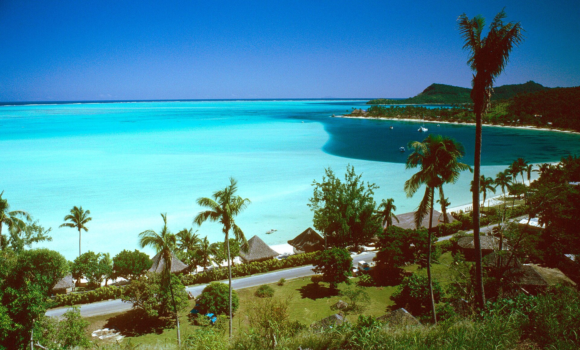 Matira Beach curving along Bora Bora's southern point