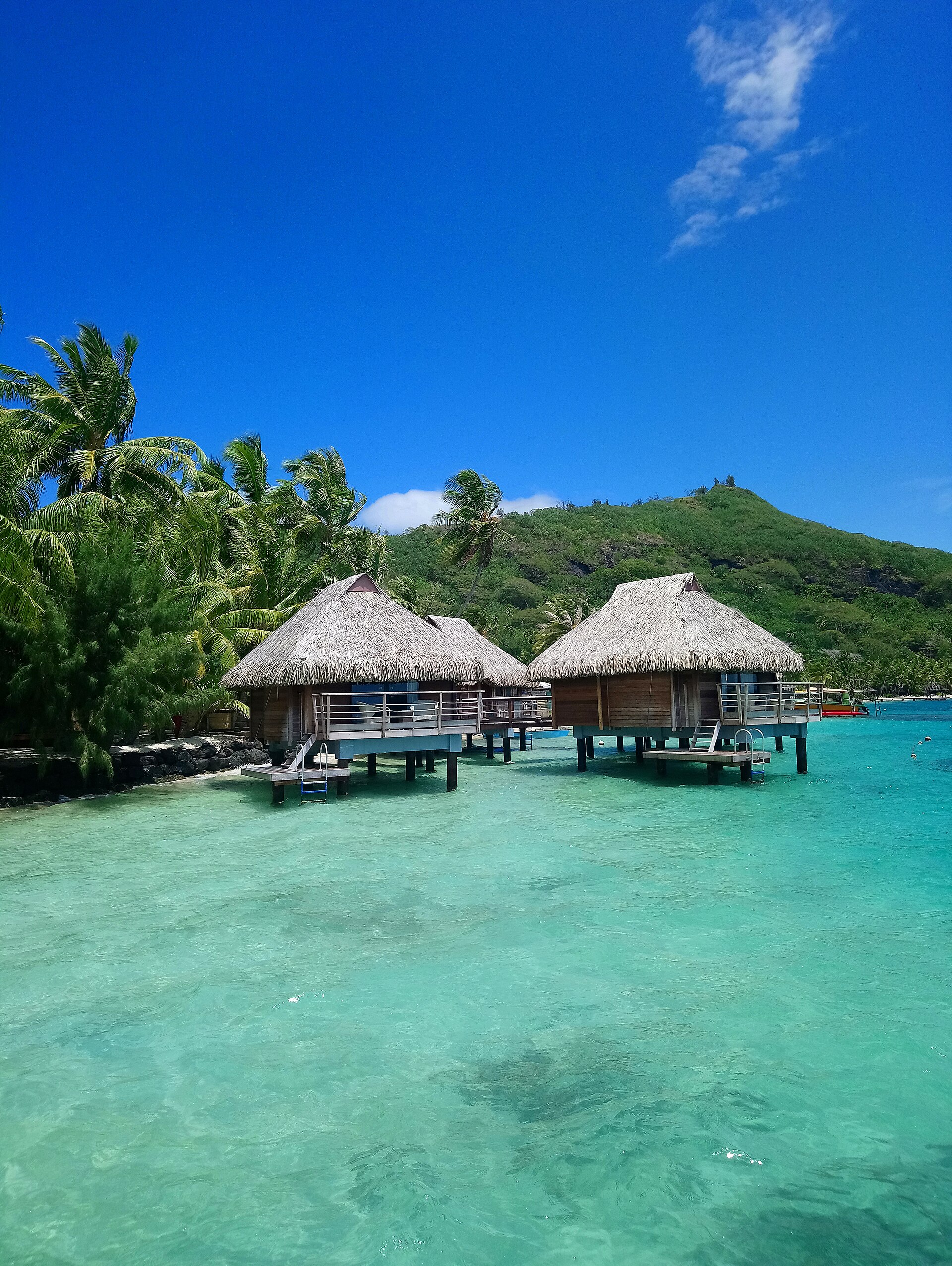 Overwater bungalows on Bora Bora's turquoise lagoon