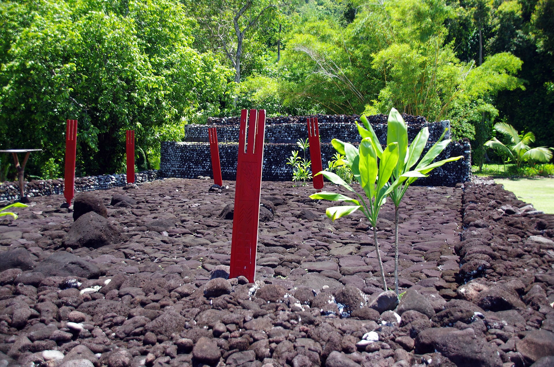 Restored court of Marae Arahurahu with offering posts