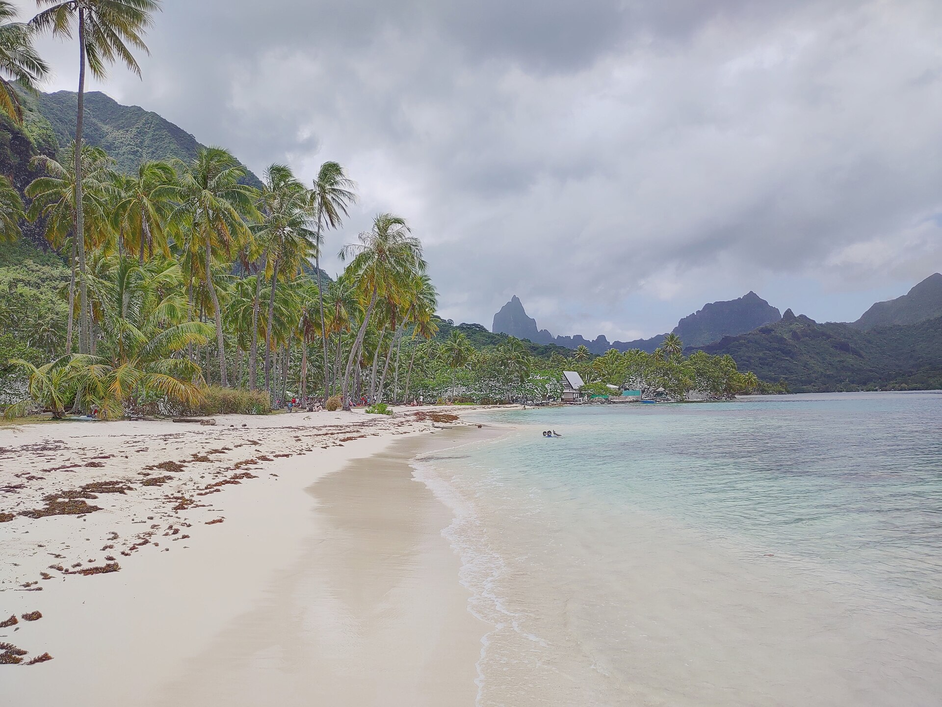 A quiet beach on Moorea with Rotui beyond