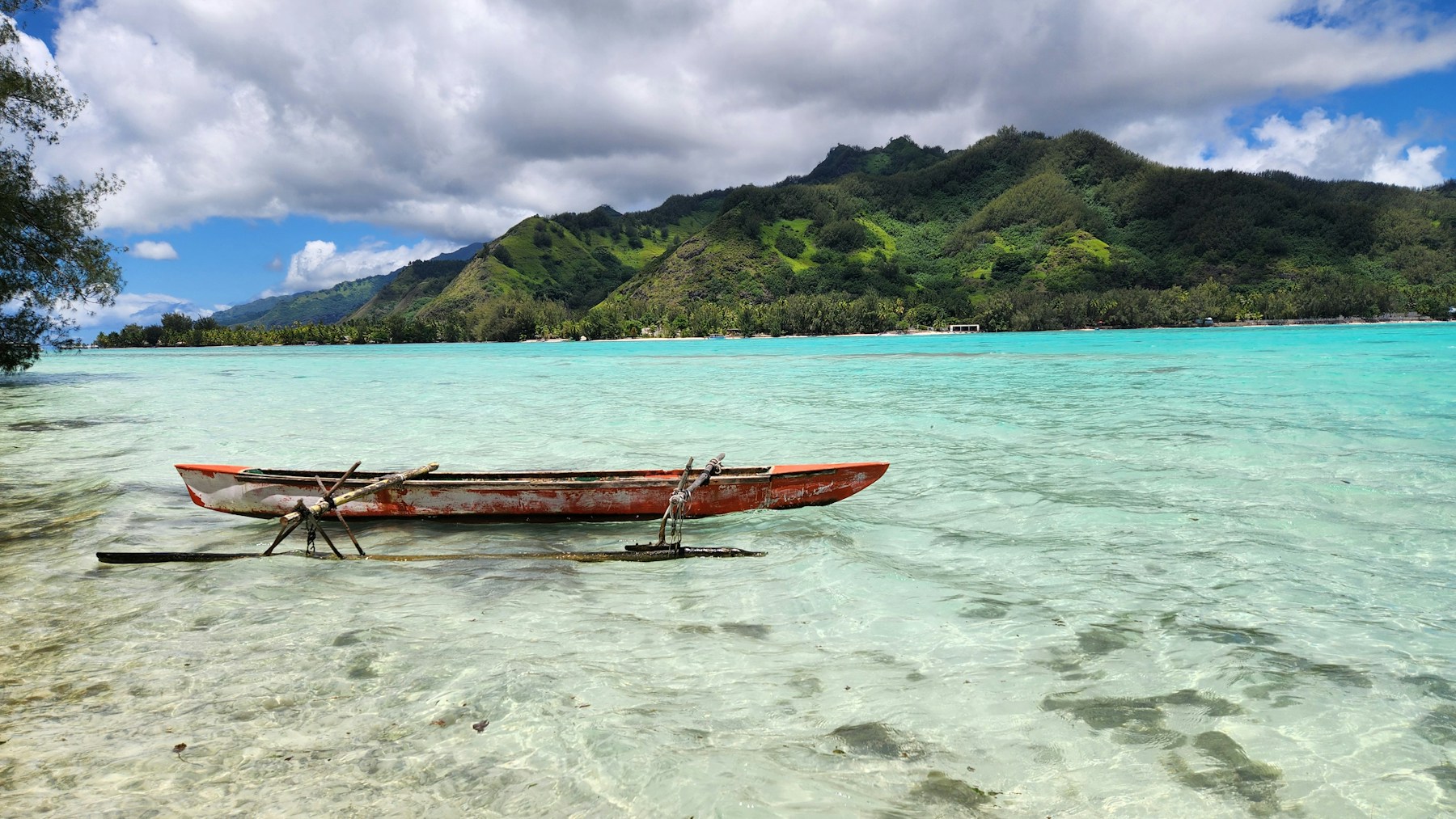 A calm bay beneath Moorea’s volcanic ridges