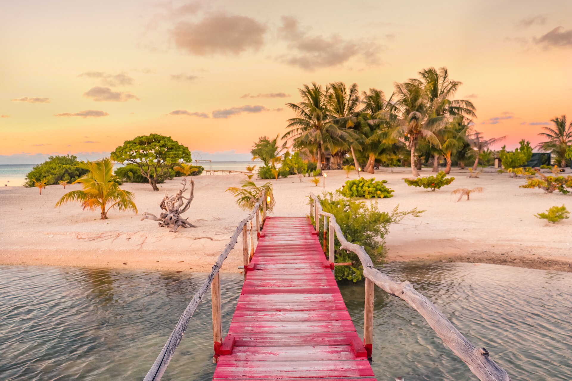 Sunset over a pier at Tikehau